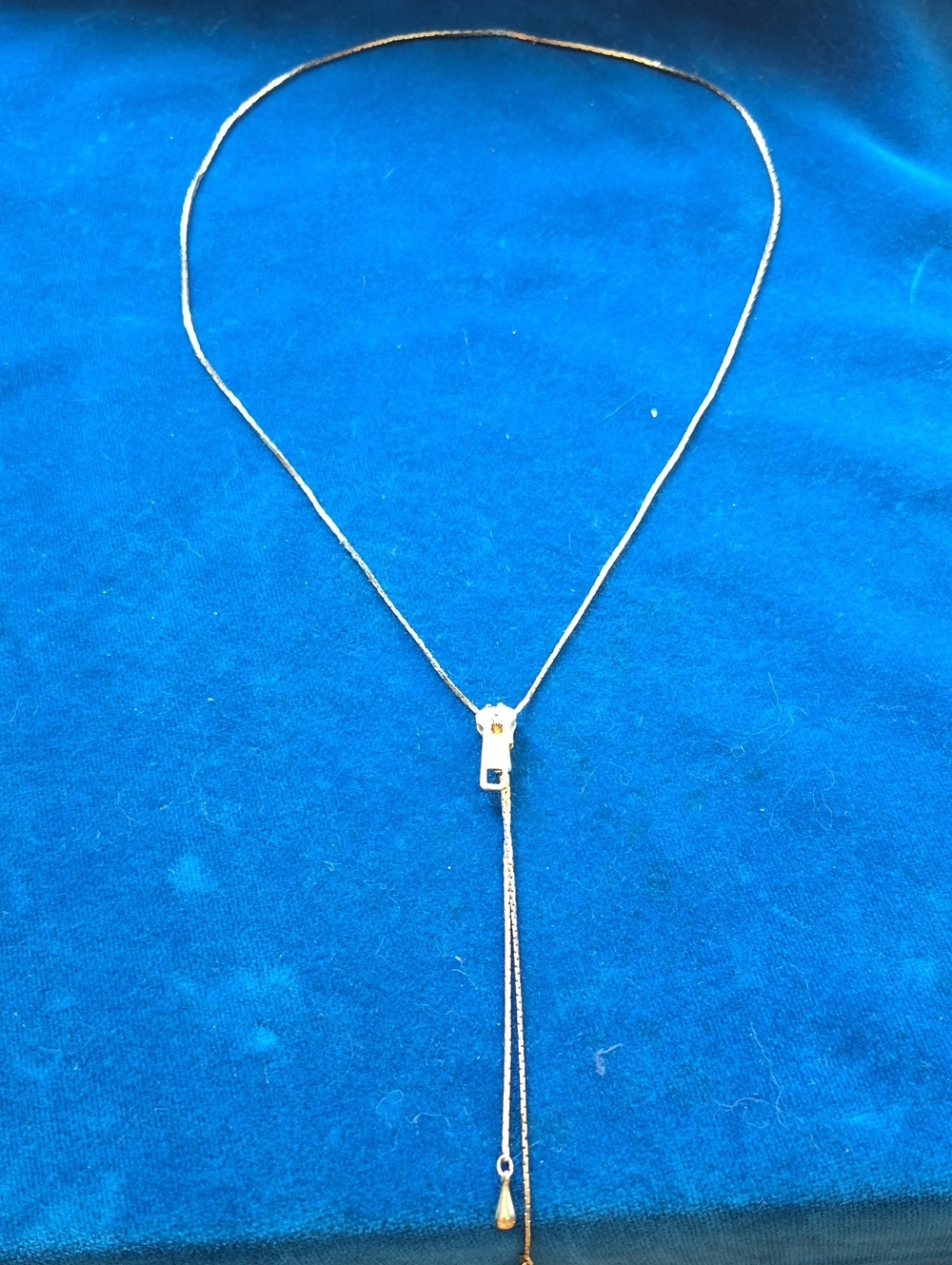 Gold tone zipper necklace